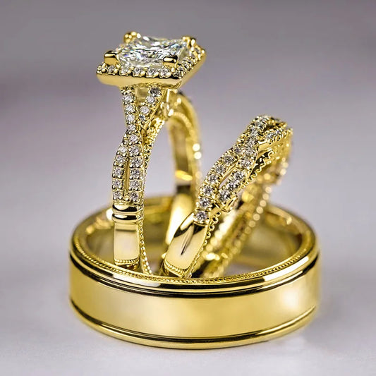 A set of three 14K gold rings with lab diamonds, including an engagement ring, a wedding band, and a promise ring.